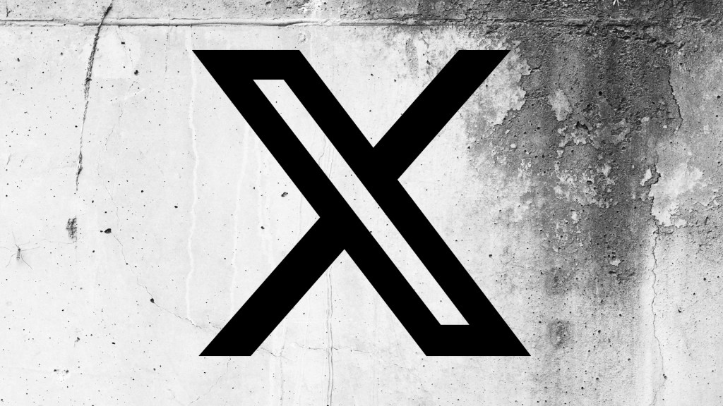 Logo X (dawniej Twitter) na popękanej ścianie
