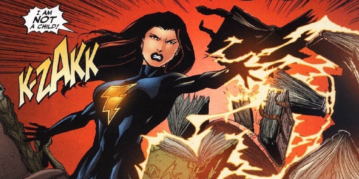 Mary Marvel używa swojej błyskawicy do wysadzania książek w DC Comics.