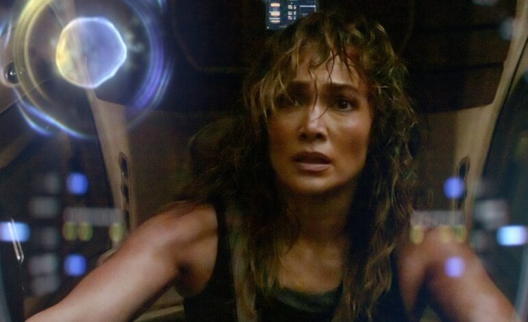 Godny wzruszenia ramion pojazd science-fiction Jennifer Lopez