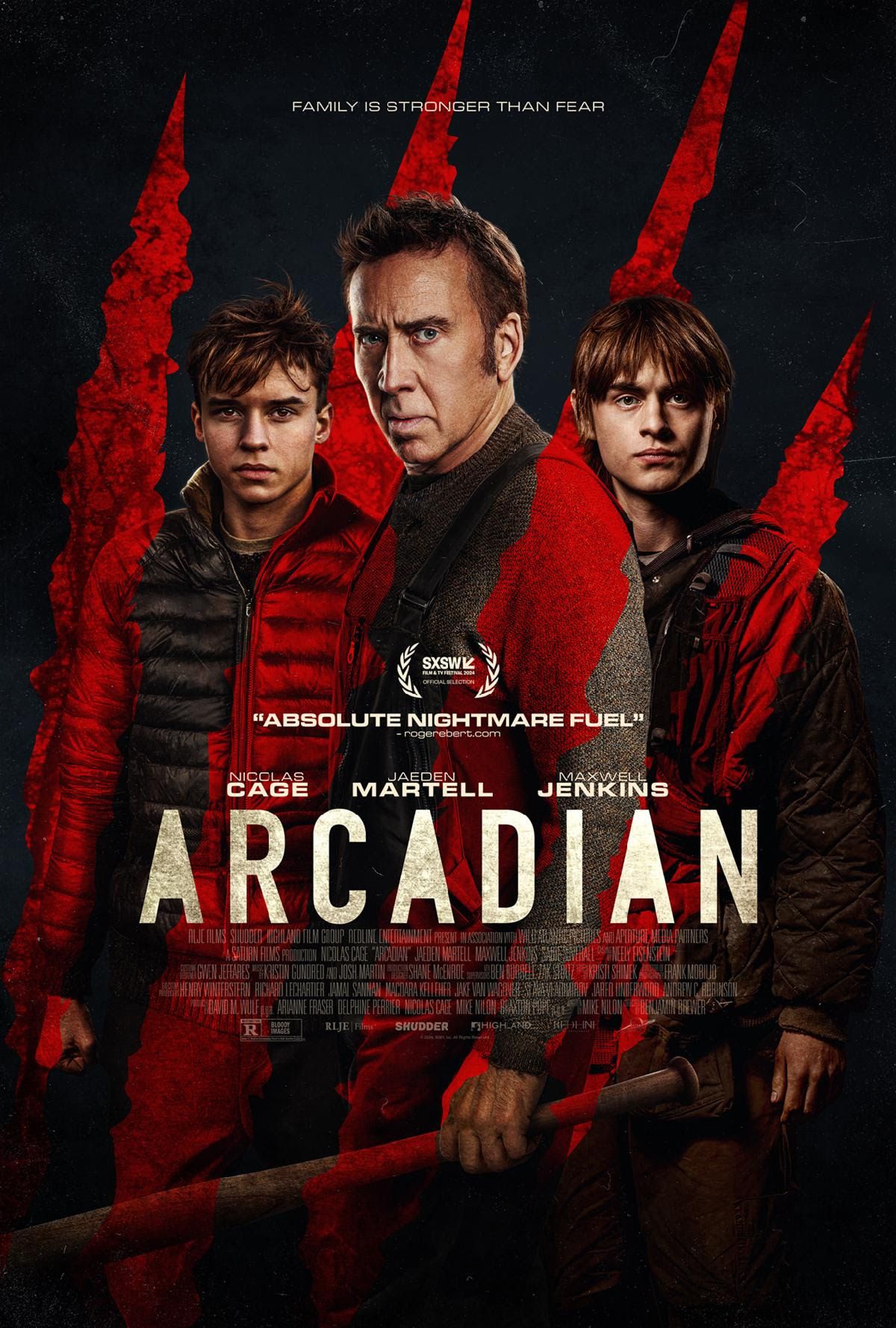 Arkadyjski plakat filmowy przedstawiający Nicolasa Cage'a, Jaedena Martella i Maxwella Jenkinsa