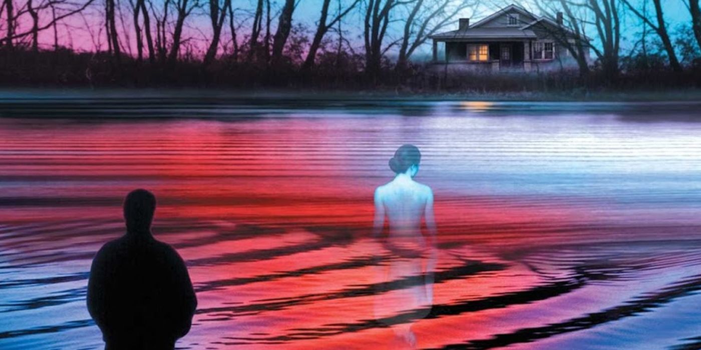 Okładka Bag of Bones autorstwa Stephena Kinga, przedstawiająca kobietę brodzącą do krwistoczerwonego jeziora