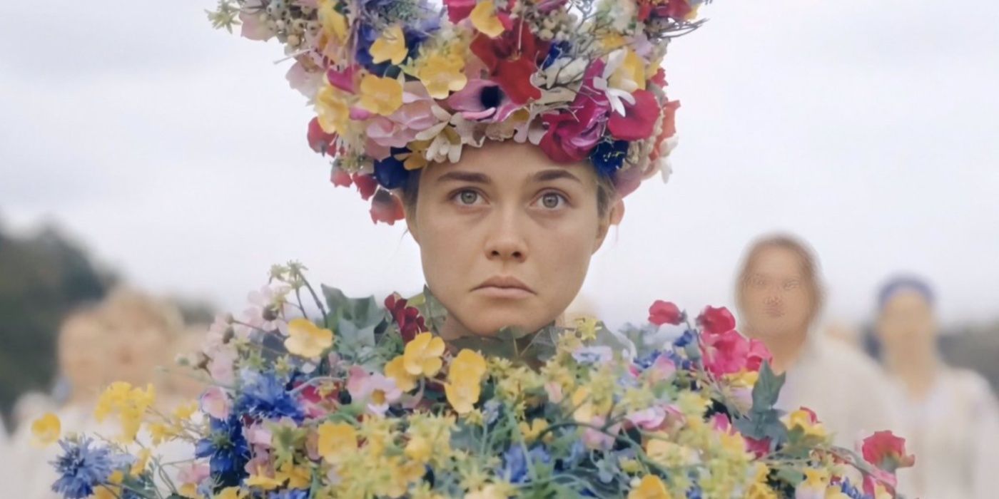 Florence Pugh jako Dani Ardor w stroju Królowej Maja, marszcząc brwi w filmie Midsommar