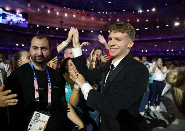 Igrzyska Olimpijskie Paryż 2024 - Ceremonie - Ceremonia zamknięcia Paryż 2024 - Stade de France, Saint-Denis, Francja - 11 sierpnia 2024 r. Leon Marchand z Francji podczas ceremonii zamknięcia. REUTERS/Phil Noble