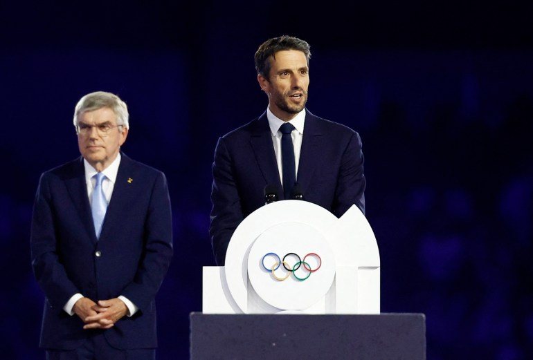 Prezydent Tony Estanguet i prezydent Międzynarodowego Komitetu Olimpijskiego (MKOl) Thomas Bach podczas ceremonii zamknięcia